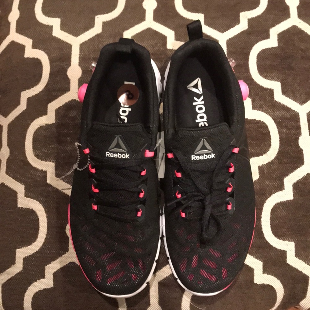 Reebok  👟 size 8